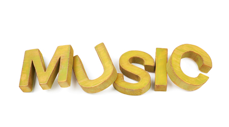Word Music made of colored with paint wooden letters, composition isolated over the white backgroundの写真素材