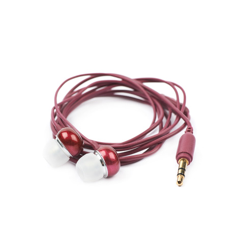 Pair of maroon colored earplug headphones isolated over the white backgroundの写真素材