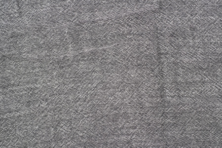 Gray fabric close-up fragment as a background texture
