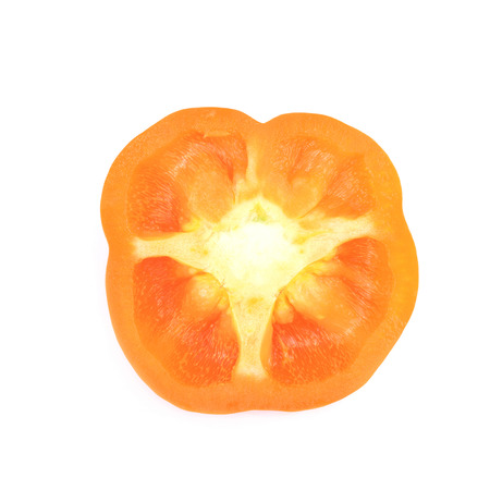 Slice of an orange bell pepper isolated over the white backgroundの写真素材