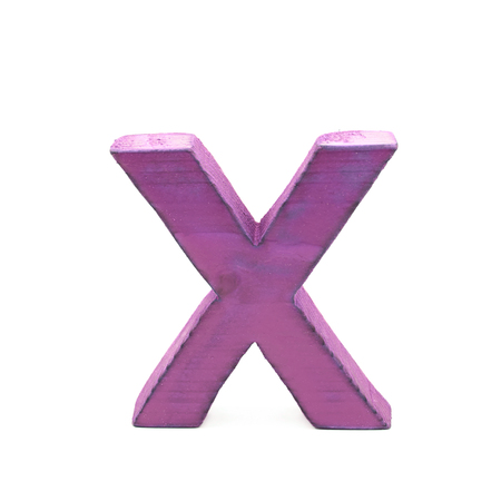 Single sawn wooden letter X symbol coated with paint isolated over the white backgroundの写真素材