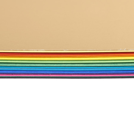 Pile of colorful A4 sheets of paper isolated over the white background, close-up crop fragment as a copyspace backdrop compositionの写真素材