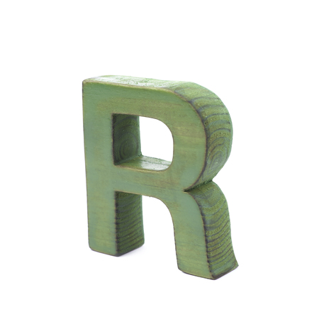 Single sawn wooden letter R symbol coated with paint isolated over the white backgroundの写真素材