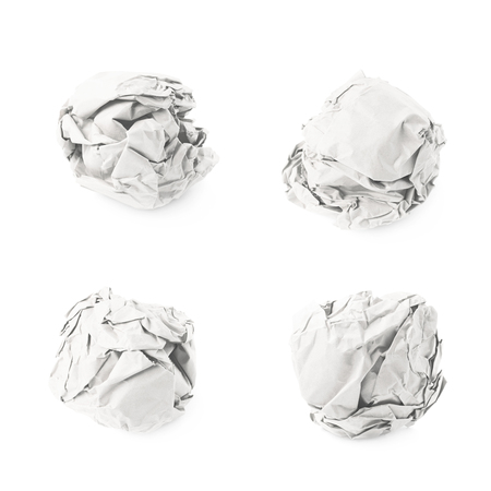 Crumbled paper ball isolated over the white backgroundの写真素材