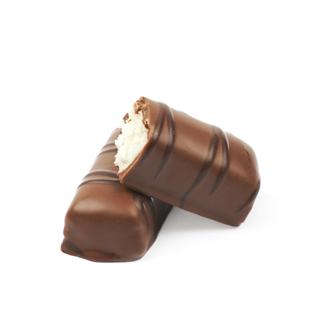 Composition of two chocolate confection candies isolated over the white backgroundの写真素材