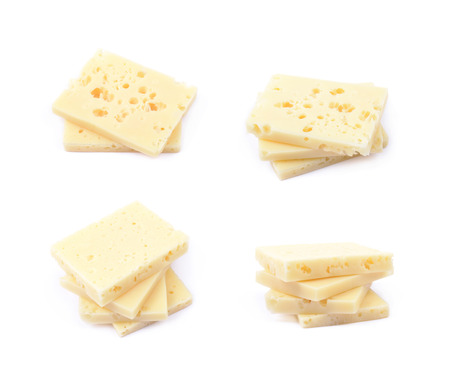 Pile of cheese slices isolatedの写真素材
