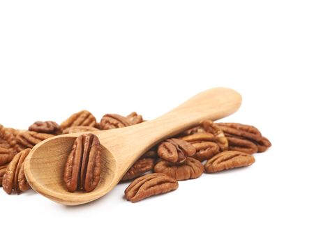 Pile of pecan nuts isolatedの写真素材