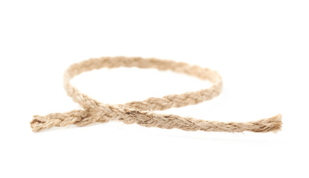Fragment of a linen rope isolatedの写真素材