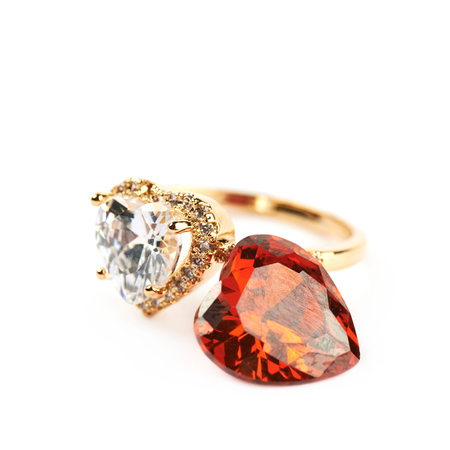 Golden ring with a gem stone isolatedの写真素材