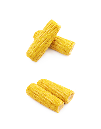Composition of two corncobs isolated over the white background, set of two different foreshorteningsの写真素材