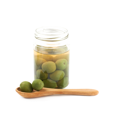 Jar of green olives isolatedの写真素材