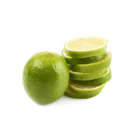 Pile of multiple lime slices isolatedの写真素材