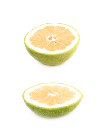 Sliced sweet grapefruit isolated over the white backgroundの写真素材