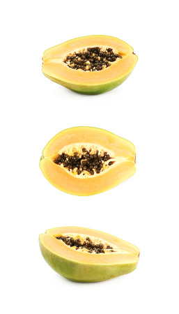 Sliced half of a papaya fruit isolatedの写真素材