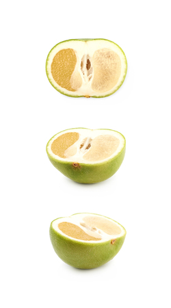 Sliced sweet grapefruit isolated over the white backgroundの写真素材