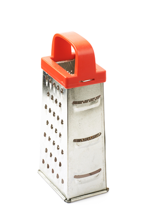 Metal food grater utensil isolated over the white backgroundの写真素材
