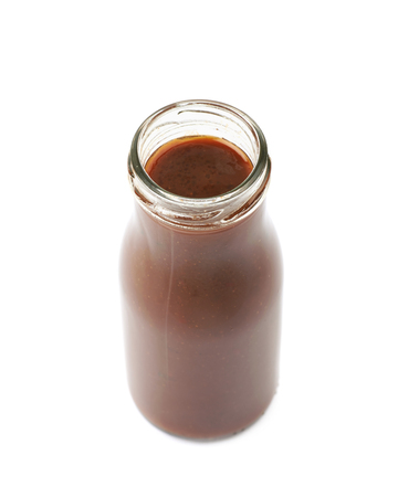 Bottle jar of barbecue sauce condiment isolated over the white backgroundの写真素材