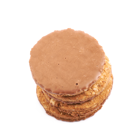 Pile of chocolate oatmeal cookies isolated over the white backgroundの写真素材