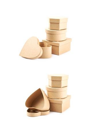 Pile of paper gift boxes isolated over the white background, set of two different foreshorteningsの写真素材
