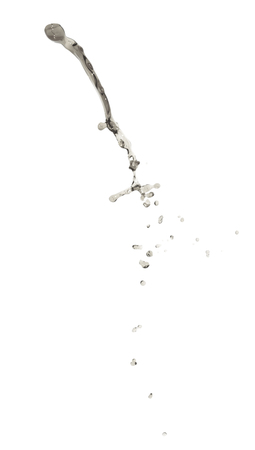 Splash of transparent liquid in motion isolated over the white backgroundの写真素材