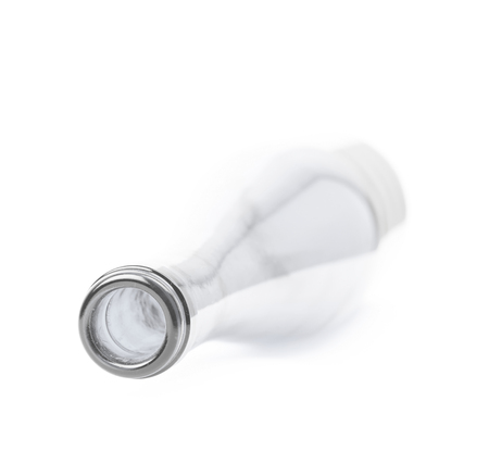 Colored glass bottle isolated over the white backgroundの写真素材