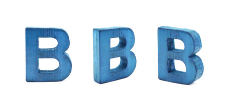 Single sawn wooden B letter symbol in different angles and foreshortenings isolated over the white...