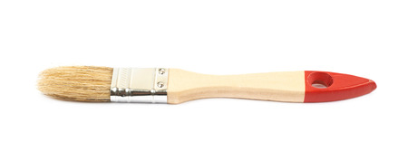 Wide wooden paint brush isolated over the white backgroundの写真素材