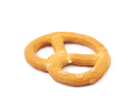 Salted pretzel isolated over the white backgroundの写真素材