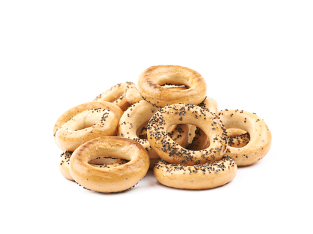 Poppy seeds bagel composition isolated over the white backgroundの写真素材