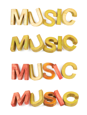 Word Music made of colored with paint wooden letters, composition isolated over the white background, set of four different foreshorteningsの写真素材