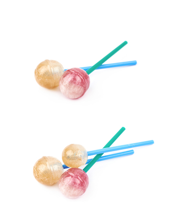Lollipop candy isolated over the white background, set of two different foreshorteningsの写真素材