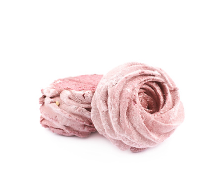 Marshmallow pink zephyr confection isolated over the white backgroundの写真素材