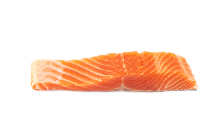 Raw salmon fish fillet fragment isolated over the white backgroundの写真素材