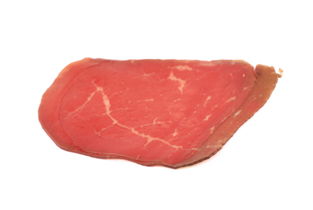 Sliced ham isolated over the white backgroundの写真素材