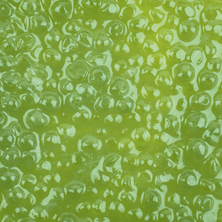 Surface coated with the green caviarの写真素材