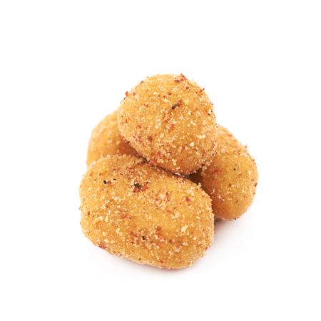 Pile of breadcrumb coated spiced nuts isolated over the white backgroundの写真素材