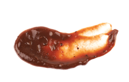 Splash of barbecue sauce isolated over the white backgroundの写真素材