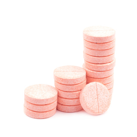 Drug tablet pills isolated over the white backgroundの写真素材