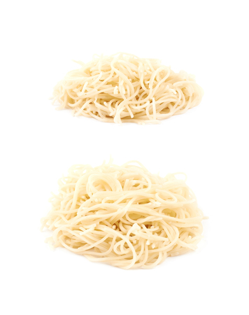 Pile of cooked noodles isolated over the white background, set of two different compositionsの写真素材