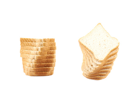 Sliced white bread isolated over the white background, set of two different compositionsの写真素材