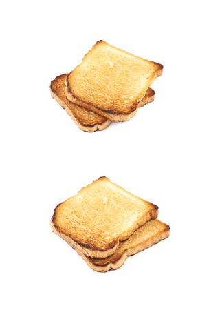 Toasted white bread isolated over the white background, set of two different compositionsの写真素材