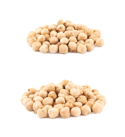 Pile of chick peas isolated over the white background, set of two different foreshorteningsの写真素材