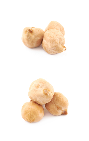 Pile of chick peas isolated over the white background, set of two different foreshorteningsの写真素材
