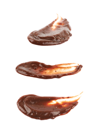 Splash of barbecue sauce isolated over the white background, set of three different foreshorteningsの写真素材