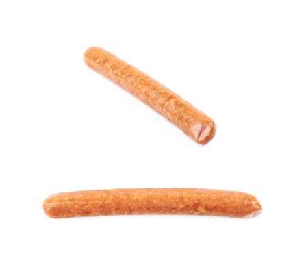 Hot dog sausage isolated over the white background, set of two different foreshorteningsの写真素材