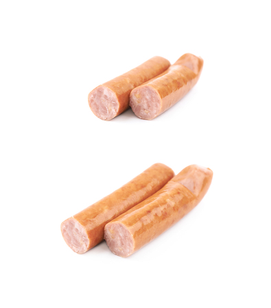 Hot dog sausage composition isolated over the white background, set of two different foreshorteningsの写真素材