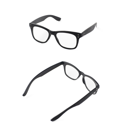 Pair of wooden textured optical reading glasses isolated over the white background, set of two different foreshorteningsの写真素材