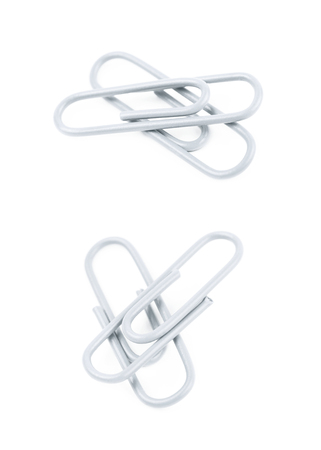 Pile of office clips isolatedの写真素材