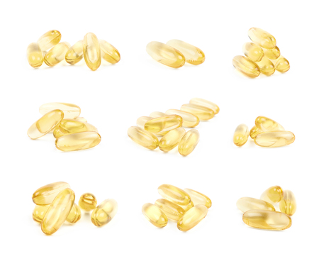 Pile of softgel pills isolatedの写真素材