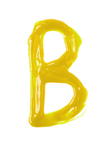 Single letter made of sauce isolatedの写真素材